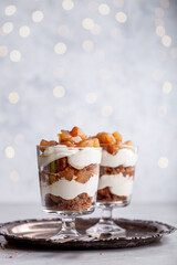 Christmas dessert with gingerbread cookies and pears - 538940760