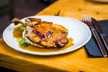 Canard du Ciel Braised duck leg, duck breast, seared four gras, pommes yam, coriander port wine sauce .