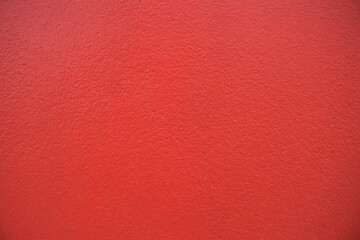 Fototapeta premium Cement red plaster wall have rough surface concrete. Red background abstract design are light with gradient background.
