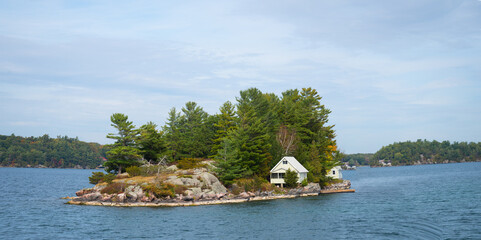 Summer cottage scene on a small lake in Thousand Islands on ST. Lawrence River