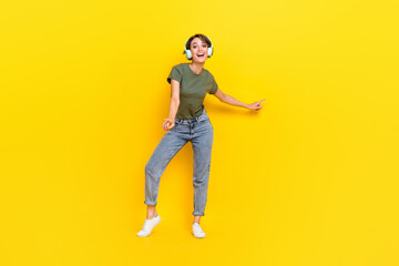 Fototapeta na wymiar Full length photo of positive cool lady stylish clothes good mood finger hand point show empty space isolated on yellow color background