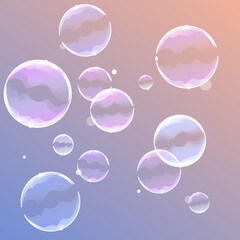Soap bubbles on a pink blue background
