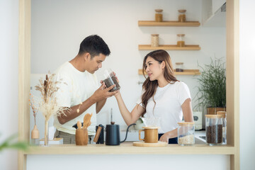 Couple or asian people to smell coffee bean, make or brew coffee in kitchen home. Include cup, mug,...