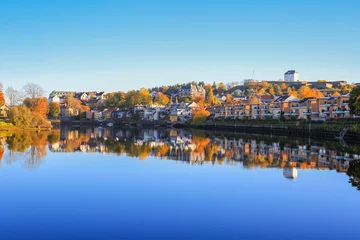 Foto op Canvas Autumn in Trondheim, view of the river Nidelva © liramaigums