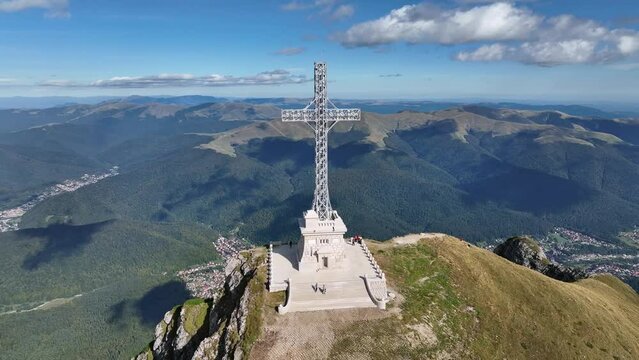 View of the Cross of Heroes on Mount Caraiman in the Bucegi Mountains, Romania