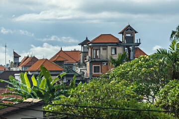 Fototapeta na wymiar Aerial view of Ubud town in Bali, old houses and roofs of Ubud, Indonesia
