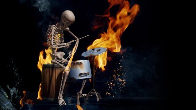 Burning skeleton plays drums. Slow motion fire flames and sparks on black background.