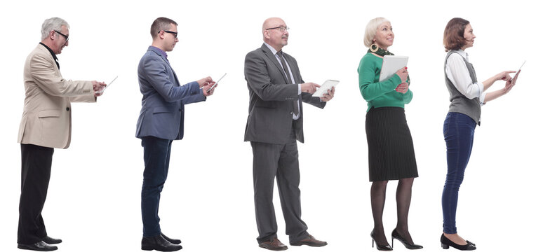 Group Of People Holding Tablet And Looking Ahead