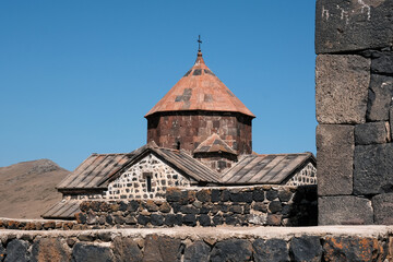 Fototapeta na wymiar View of Surp Astvatsatsin (Holy Mother of God) church of Sevanavank monastery on sunny summer day, Armenia.