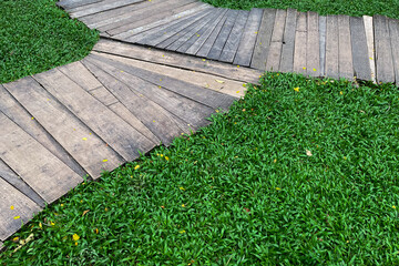 Top view wooden junction walkway grass  field background texture, shot from above. abstract...
