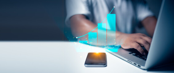 Smart phone or computer with chart, Investment in business and financial concept of growth and success. Investor data analysis for planning in strategy.