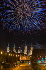 Fireworks in Zaragoza, end of festivities 2022. Cathedral in the background