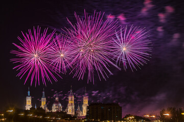 Fireworks in Zaragoza, end of festivities 2022. Cathedral in the background