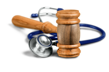 Gavel and stethoscope  on background, symbol photo for bungling and medical error