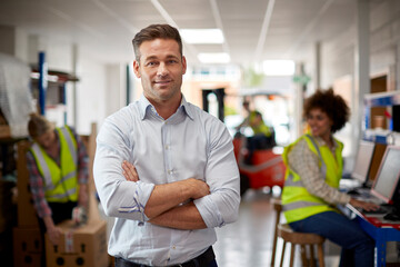Portrait Of Male Manager In Logistics Distribution Warehouse