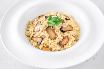 Portion risotto with mushrooms