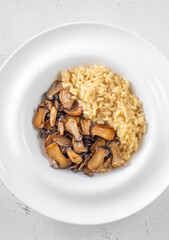Portion risotto with mushrooms