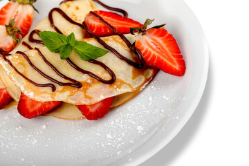 Crepes with curd cheese and strawberries