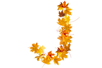 Alphabet letters made with yellow autumn leaves to form the capitals on a stone background. The letter j