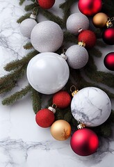 Christmas tree decorations on white marble surface