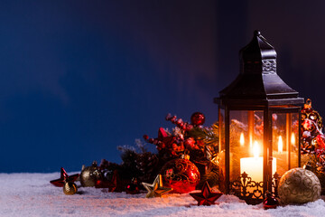 Christmas lantern in snow