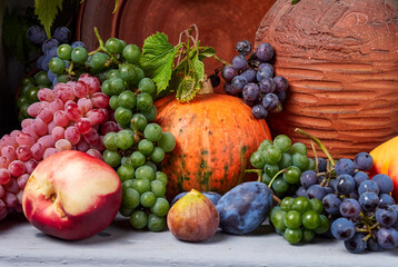 Naklejka na ściany i meble Beautiful still life with different varieties of fruit