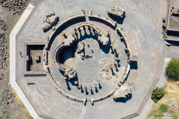 Birds eye view of Zvartnots Cathedral ruins on sunny summer day. Vagharshapat, Armenia.