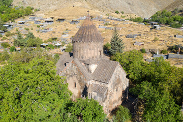 Aerial view of Surp Astvatsatsin Church (built in 1031) on sunny summer day. Bjni village, Kotayk Province, Armenia.