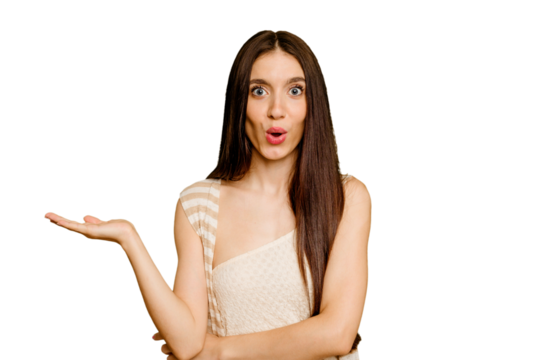 Young caucasian long hair woman isolated impressed holding copy space on palm.