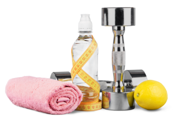 Dumbbells with bottled water , measuring tape and towel isolated on white background