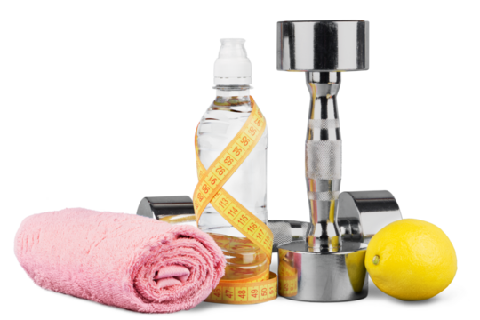 Dumbbells with bottled water , measuring tape and towel isolated on white background