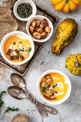 Pumpkin and vegetable puree soup with croutons