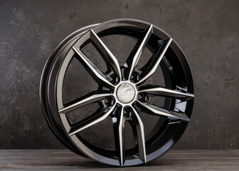 Beautiful lightweight new alloy wheel, black with polishing. auto parts and design.