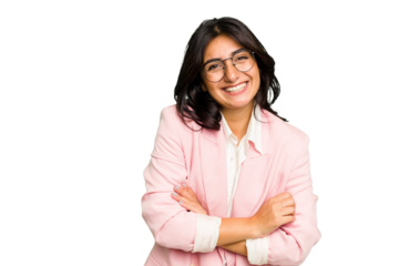 Young Indian business woman wearing a pink suit isolated laughing and having fun.