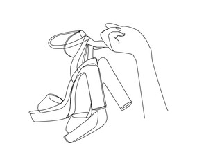 Continuous one line drawing of hand holding elegant highheels shoes. Women stiletto heels line art drawing vector design.