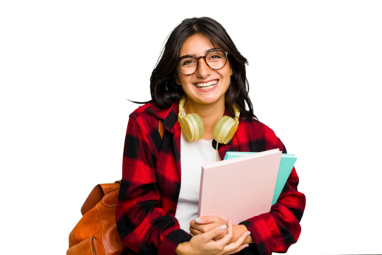 Young student Indian woman wearing headphones isolated laughing and having fun.