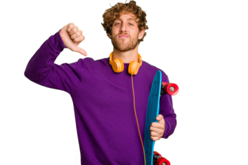 Young skater caucasian man isolated on white background showing a dislike gesture, thumbs down. Disagreement concept.