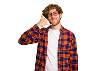 Young caucasian man isolated on green chroma background showing a mobile phone call gesture with fingers.