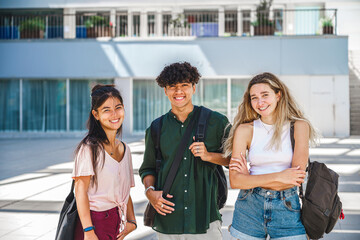 Cheerful diverse students on street