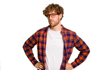 Young caucasian man isolated on green chroma background frowning face in displeasure, keeps arms folded.