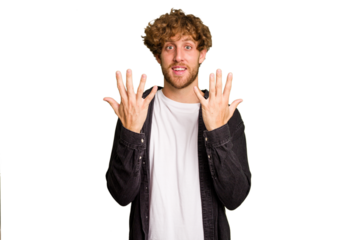 Young caucasian man isolated on green chroma background showing number ten with hands.