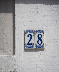 Decorative tiled house number in the town of Philipsburg, Dutch Caribbean island of Sint Maarten