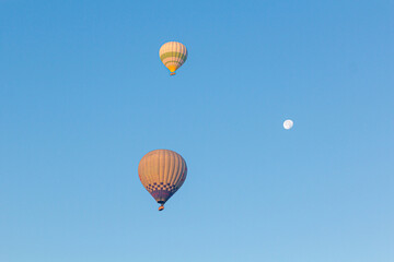 Hot air balloons and a moon