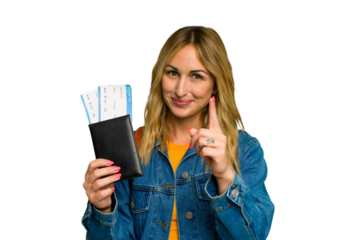Young caucasian woman holding a passport isolated on green chroma background showing number one with finger.
