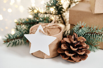 Christmas sustainable gift boxes with blank gift card. Christmas zero waste, boxing day and winter holiday