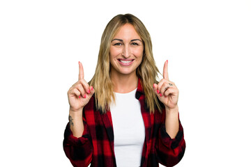 Young caucasian woman isolated on green chroma background indicates with both fore fingers up...