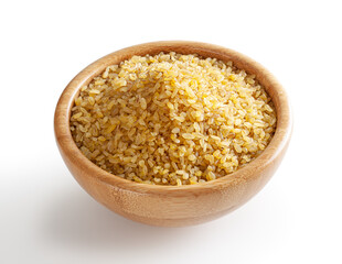 Uncooked bulgur in wooden bowl isolated on white background with clipping path