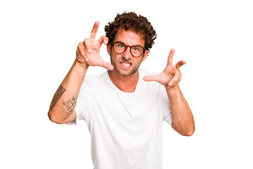 Young caucasian curly hair man isolated Young caucasian man with curly hair isolated upset screaming with tense hands.