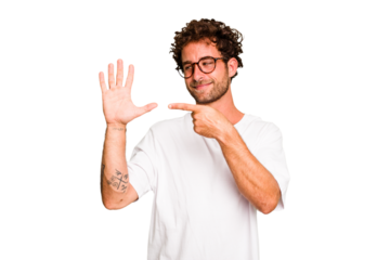 Young caucasian curly hair man isolated Young caucasian man with curly hair isolated smiling cheerful showing number five with fingers.