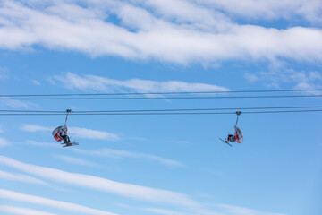 Erzincan, Turkey, January 29, 2022: Chairlift with people at ski resort. Winter vacation